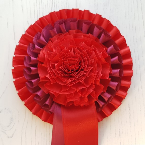 F502 rosette with a rose centre